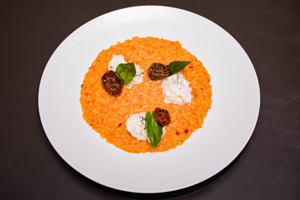 Sekrety smakowej podróży przez włoską kuchnię – odkryj nieznane smaki risotto